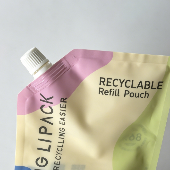 Spout pouch nozzle detail recyclable refillable packaging