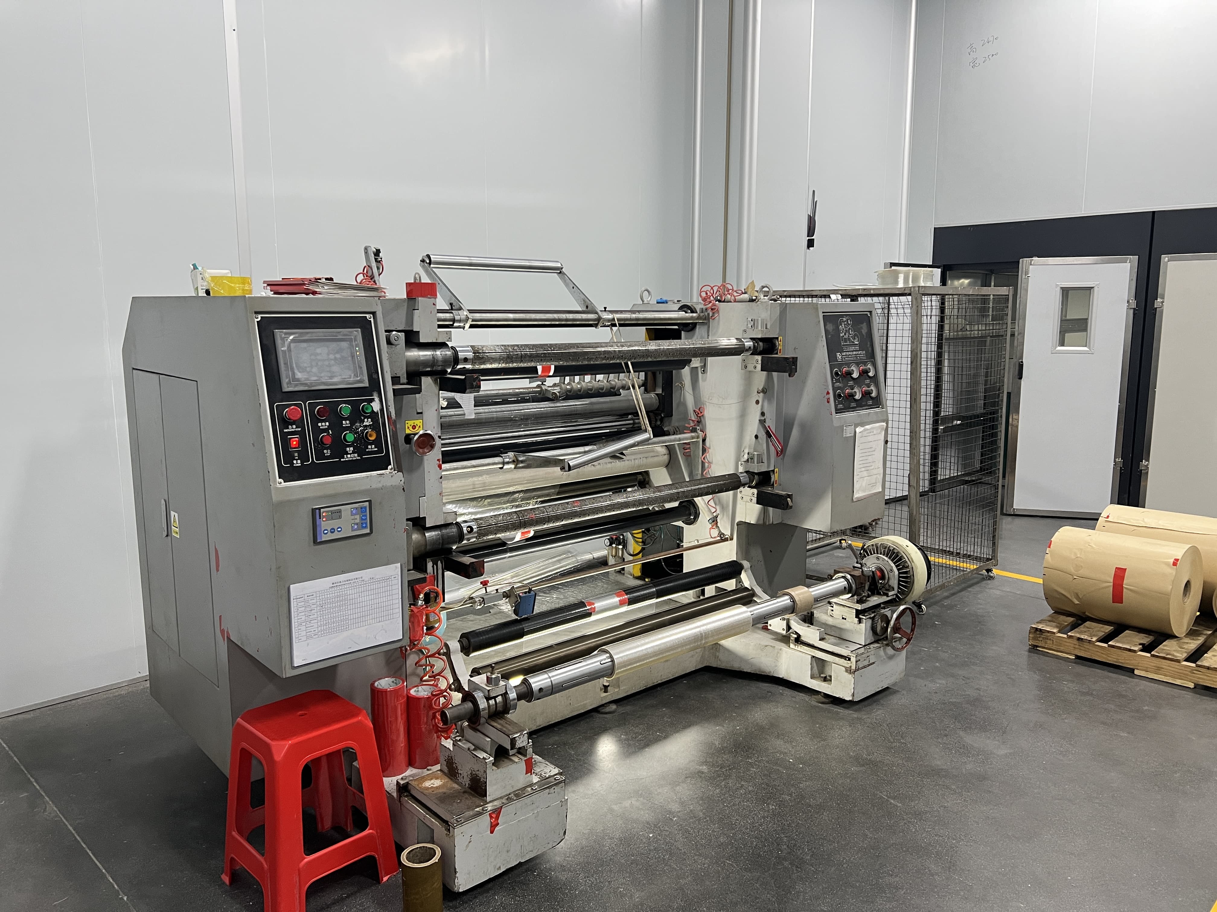 Slitting and rewinding process for custom flexible packaging film